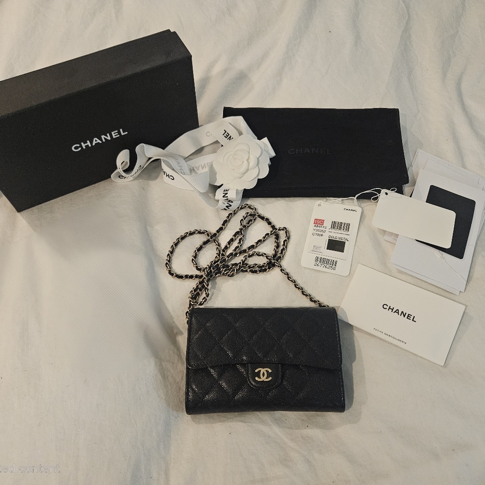 CHANEL Black Quilted Wallet on Chain